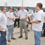 CST staff talking in groups outside