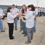 staff gathering and talking outside