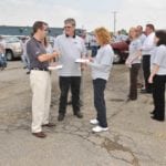 staff gathering and talking outside