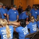 CST team members gathered around a table