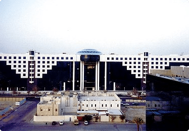 large building with smaller one in front