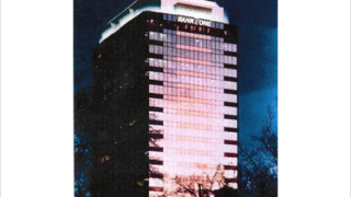 tall building lit up at night