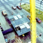 crane lifting large building piece