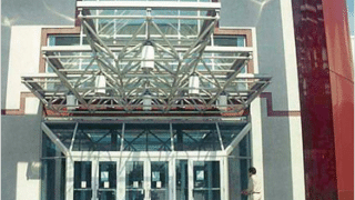 Front of building with covered entrance