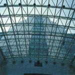 looking up at trusses and windows
