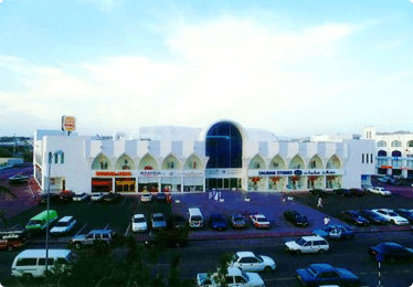 large white strip mall