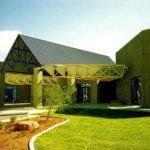 building with truss entrance and walkway