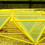Yellow trusses before hung on building