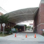 truss covered walkway between buildings