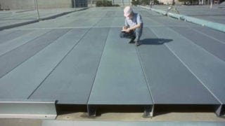 Worker assessing Durable Cover
