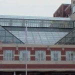 Glass structure part of building