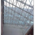 Glass structure part of building