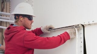 worker performing an inspection